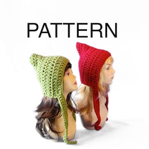 May include: Two crocheted hats with long ties. One hat is green and the other is red.