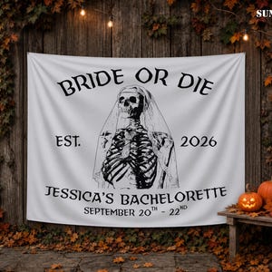 May include: A white fabric banner featuring a black graphic of a skeleton wearing a bridal veil. The text reads BRIDE OR DIE, EST. 2026, JESSICA'S BACHELORETTE, and SEPTEMBER 20TH - 22ND. The design is centered on the rectangular banner.