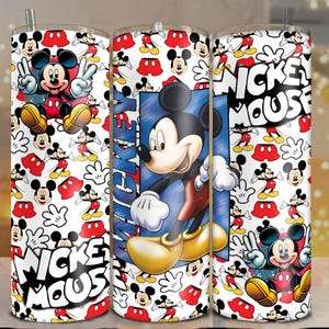 May include: Three stainless steel tumblers with a Mickey Mouse theme. The tumblers feature a white background with Mickey Mouse illustrations, red shorts, and yellow shoes. One tumbler has the text "Mickey Mouse".