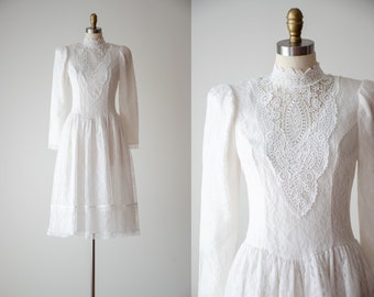 vintage wedding dress | 80s vintage Gunne Sax Jessica McClintock white lace high collar fit and flare long sleeve midi dress