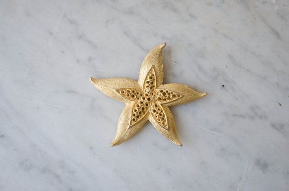 gold starfish brooch - image 1