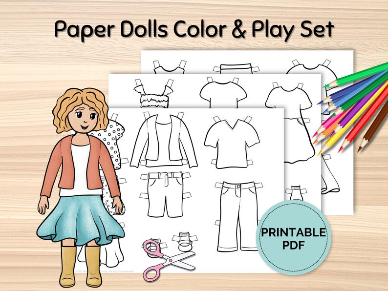 May include: A colorful paper doll set with a cartoon girl in a blue skirt and orange jacket. The set includes printable paper doll clothes and a pair of scissors. The text "Paper Dolls Color & Play Set" is at the top.