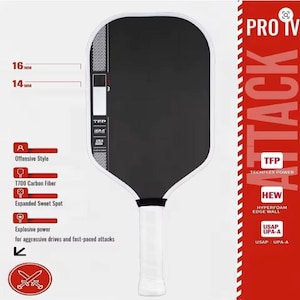 May include: Black and white pickleball paddle with a white handle. The paddle has a black face with white trim and the text "PRO TV ATTACK". Features include T700 carbon fiber and an expanded sweet spot. Measurements are 16 mm and 14 mm.