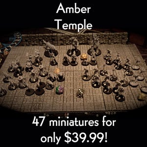May include: A tabletop gaming scene featuring 47 miniature figures, dice, and a stone-like game board. The text "Amber Temple" is at the top. The text "47 miniatures" is at the bottom.
