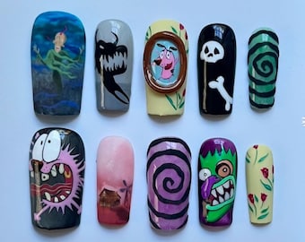 May include: A set of ten artificial nails, each painted with a different design inspired by the animated series "Courage the Cowardly Dog." Designs include characters, scenes, and patterns in various colors.