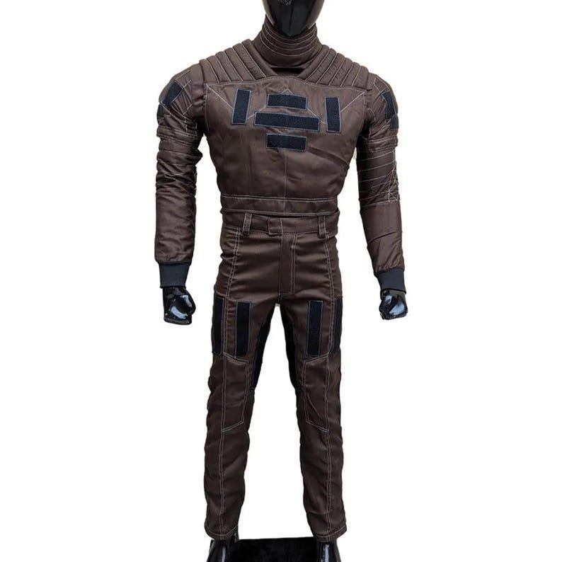 May include: Brown jumpsuit with black accents, featuring a high collar and quilted shoulder design. The suit includes a matching pair of pants and a black face covering. The overall design suggests a futuristic or tactical theme.