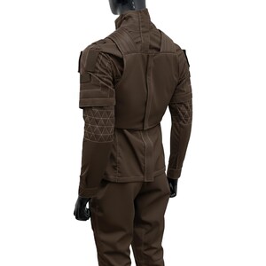 Detailed view of the flight suit sleeve showing the ribbed texture and Velcro attachments for Mandalorian gauntlets.