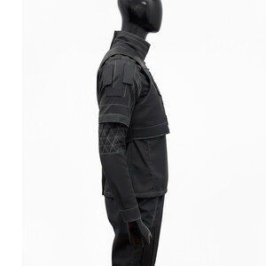 Side profile of a tailored Mando-inspired cosplay set showing the sturdy fabric and professional stitching.