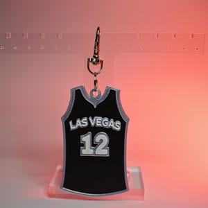 Llavero con la camiseta del equipo de la WNBA Las Vegas - 12