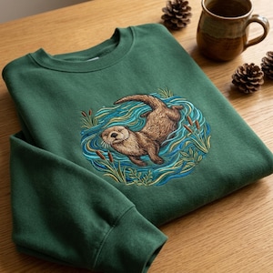 Custom Name Otter Embroidered Sweatshirt, Animal Nature Crewneck, River Lover Apparel, Forest Pullover Hoodie Gift, Outdoor Pullover