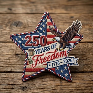 May include: Embroidered star-shaped patch with a patriotic theme. Features the text "250 Years of Freedom 1776-2026" and an American flag design with a bald eagle. The patch has red, white, and blue colors.