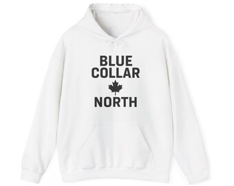 May include: A white hooded sweatshirt with a front pocket and drawstring. The front of the sweatshirt features the text "BLUE COLLAR NORTH" in bold black letters, with a black maple leaf symbol between the words.