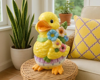 Figura grande de pato de cerámica con flores: decoración original y estilo rústico.