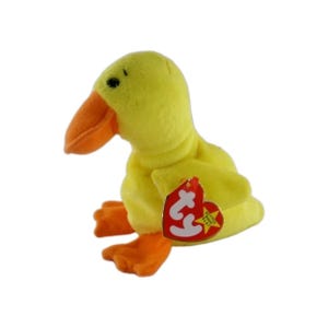May include: A yellow plush duck toy with an orange beak and orange webbed feet. The stuffed animal features a heart-shaped red and yellow tag attached to its wing with the letters ty printed in white on the front of the tag.
