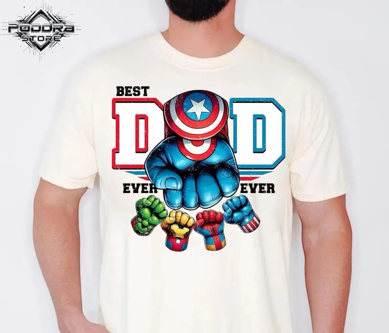 A white t-shirt with a graphic design featuring a superhero character and the text "BEST DAD EVER"