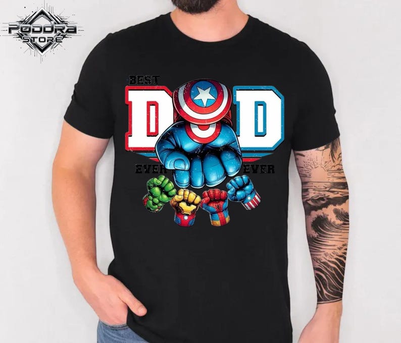 A black t-shirt with a graphic design featuring a superhero character and the text "Best Dad Ever" printed on it.