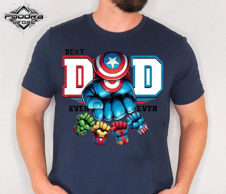 A man wearing a blue t-shirt with a graphic design featuring a superhero character and the text "Best Dad Ever".