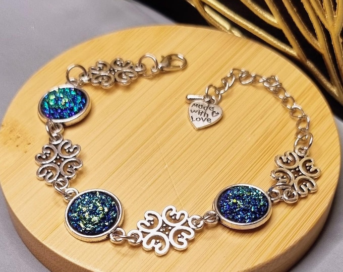 Stainless steel bracelet with 12 mm cabochons · Sparkling blue/green · Ornamental design · 17 cm + 5 cm extension