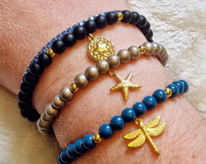 Handmade glass bead bracelet with 18k gold-plated spacer beads and gold-plated stainless steel pendant – individually selectable | Gift idea