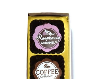 May include: A box of five gourmet caramel chocolates. The flavors are Raspberry Caramel, Coffee Caramel, Sea Salt Caramel, Peanut Butter Caramel, and Balsamic Caramel.