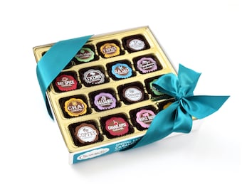May include: A gold box filled with 16 gourmet caramel chocolates. Each chocolate is topped with a different flavor, such as sea salt, coffee, and chai. The box is tied with a teal ribbon.