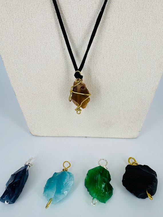 Men's rock pendant on black suede or leather cord
