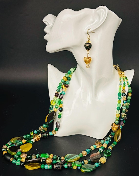 Hot jewel trends 2026 big, bright, lush green, brown + gold tropical rainforest colours. Agate Statement Necklace and Earrings.