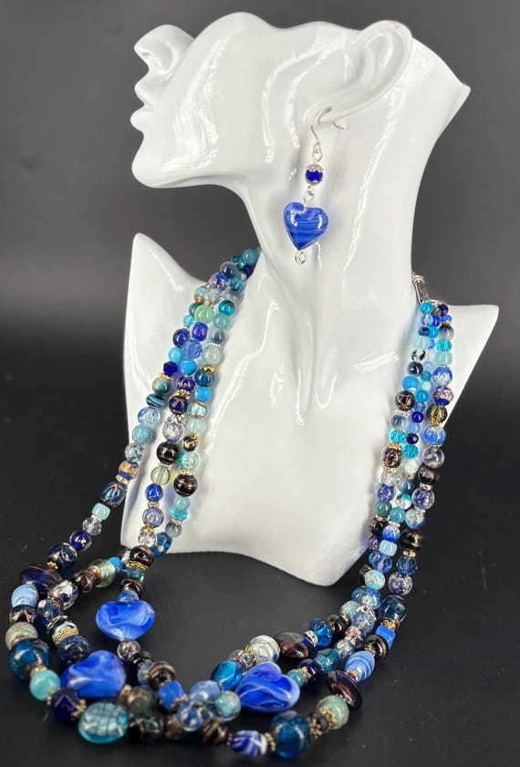 Top jewel trend 2026, bright blue large glass hearts multistrand necklace and earrings