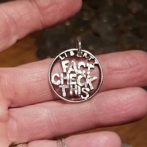 FACT CHECK THIS cut coin  quarter pendant
