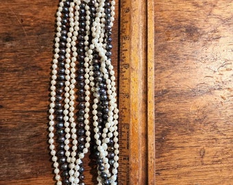Multiple strand beaded pearl necklace white and black