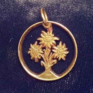 Austria 1 shilling Thistle cut coin pendant