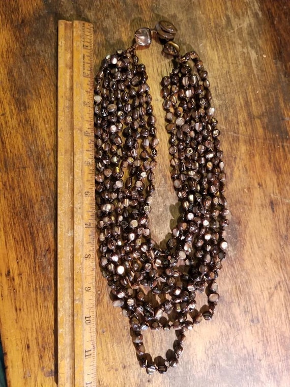 Beautiful multi strand beaded abalone bib necklace