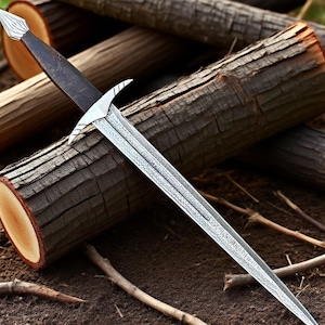May include: A silver and black sword with a detailed blade and a decorative hilt. The sword is resting on a pile of wooden logs, with a natural, earthy background. The blade has intricate patterns.