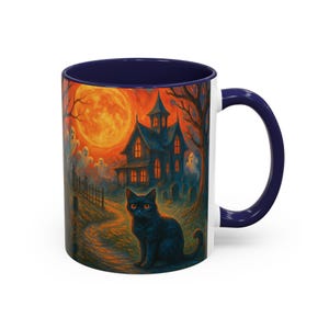 A spooky Halloween mug design featuring a glowing orange moon, eerie ghosts drifting near a gothic haunted house, and a black cat with fiery orange eyes sitting in a graveyard path. Perfect for Halloween lovers, witches, and gothic décor fans, this mug makes a unique fall kitchen piece or haunted holiday gift. Works for coffee, tea, or cocoa. Original design by The Haunted Hollow Co.™.