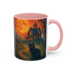A spooky Halloween mug design featuring a glowing orange moon, eerie ghosts drifting near a gothic haunted house, and a black cat with fiery orange eyes sitting in a graveyard path. Perfect for Halloween lovers, witches, and gothic décor fans, this mug makes a unique fall kitchen piece or haunted holiday gift. Works for coffee, tea, or cocoa. Original design by The Haunted Hollow Co.™.