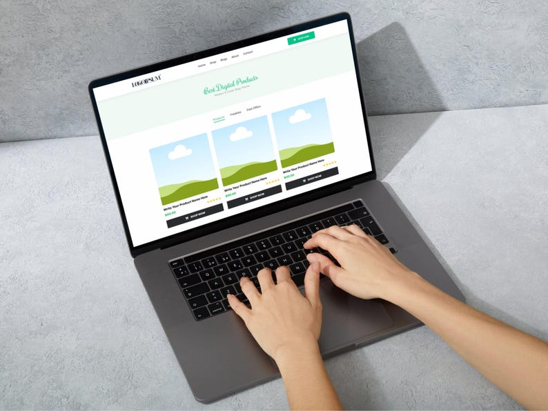 May include: A laptop displaying a website with the text "Best Digital Products." The website showcases product listings with images of landscapes. Hands are typing on the laptop keyboard.