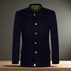 May include: A navy blue blazer with a mandarin collar and gold buttons. The jacket has two front pockets and a tailored fit. The interior lining is a patterned green fabric. This classic blazer is suitable for formal or semi-formal occasions.