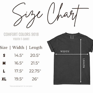 May include: A size chart for a Comfort Colors 9018 youth t-shirt. The chart lists sizes S, M, L, and XL with corresponding widths and lengths in inches. A dark gray t-shirt is shown with white arrows indicating the width and length measurements.