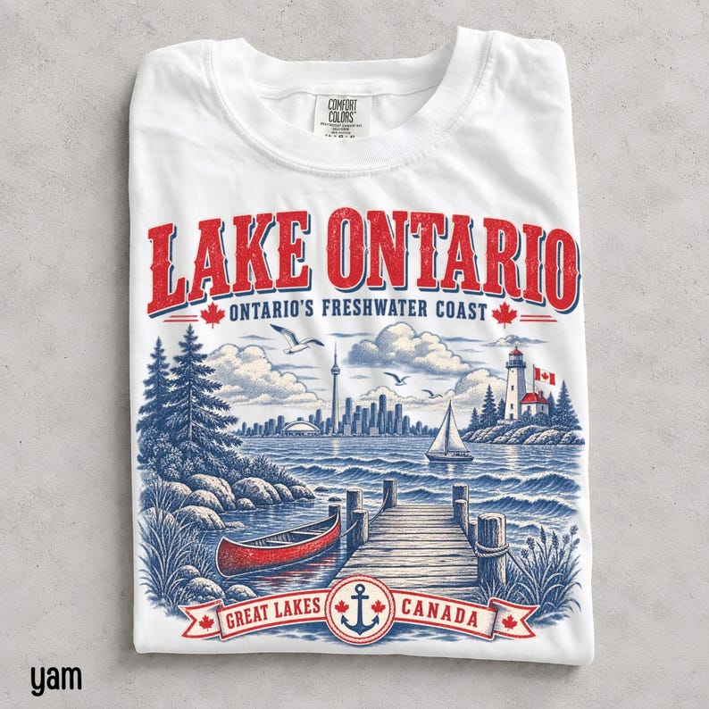 Lake Ontario Comfort Colors shirt with retro Great Lakes Canada souvenir design featuring dock, canoe, sailboat and lighthouse.