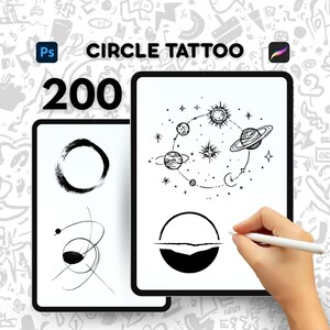 May include: Two digital tablets displaying black and white circle tattoo designs. One tablet shows a brushstroke circle and abstract lines. The other tablet features a solar system and a mountain landscape within a circle. Text reads "CIRCLE TATTOO" and "200".