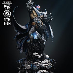 May include: A detailed resin statue of Batman in a dynamic pose, with a dark blue and metallic gray color scheme. The figure is atop a detailed base with architectural elements and stylized smoke. The statue is labeled "PRE-SUPPORTED" and "SCALE 1/6".