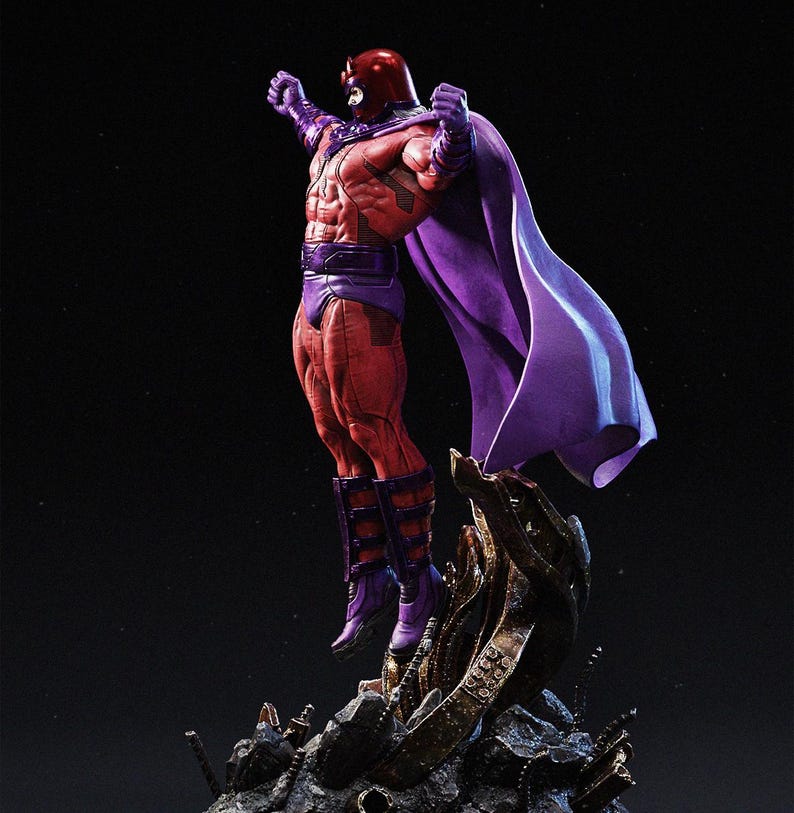 May include: A detailed figurine of a superhero in a dynamic pose. The figure is predominantly red and purple, with a helmet, cape, and boots. The figure is standing on a rocky base against a dark background. The cape is flowing in the wind.