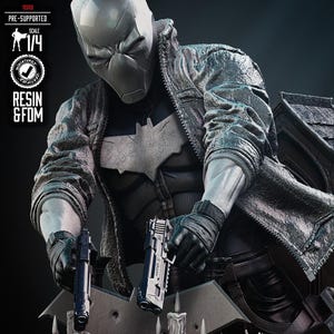 May include: A detailed resin statue of a masked figure in a jacket, holding two pistols. The figure has a bat symbol on the chest. The statue is 1/4 scale and includes the text "RESIN & FDM".