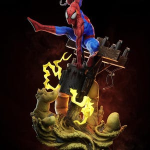 May include: A detailed figurine of Spider-Man in a dynamic pose, clad in his signature red and blue suit. The figure is perched on a detailed base with electrical components and yellow lightning effects, creating a dramatic scene.