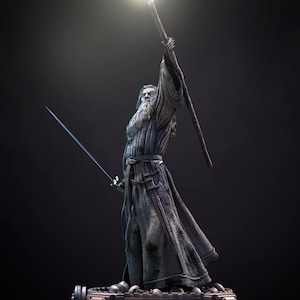 May include: A detailed statue of a wizard holding a staff with a glowing tip and a sword. The wizard is dressed in long robes and has a long white beard. The statue is set against a dark background.