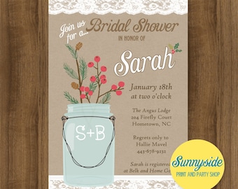 May include: A rustic-themed bridal shower invitation featuring a mason jar filled with greenery and red berries. The invitation is for Sarah's bridal shower on 18th January at two o'clock at The Angus Lodge. The invitation also includes the text "Join us for a... Bridal Shower in honour of Sarah" and "S+B" on the mason jar.