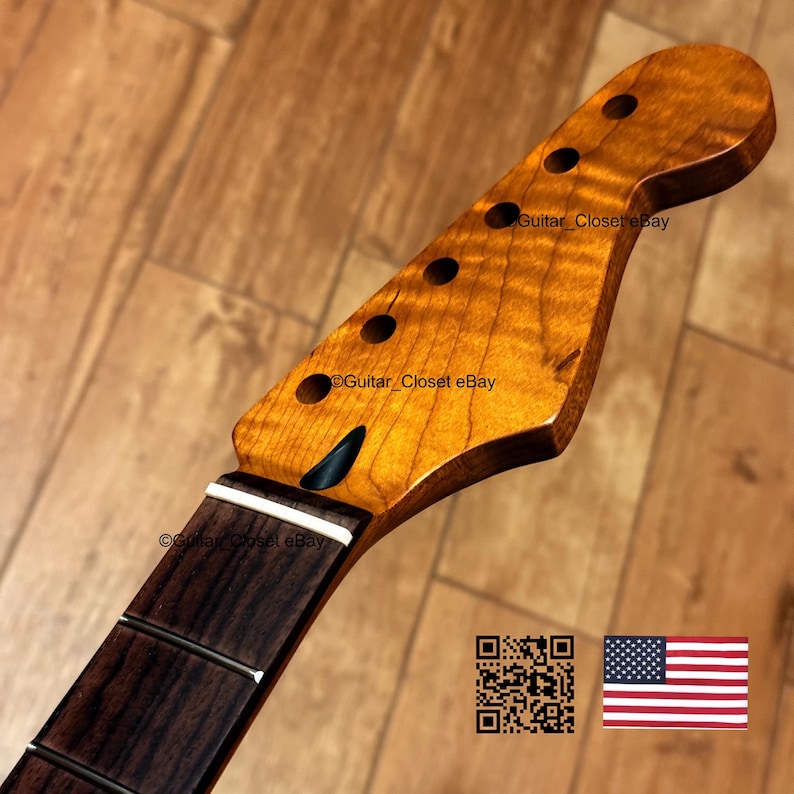 May include: A guitar neck featuring a light brown, flame-maple headstock with six tuner holes and a dark brown fretboard with a white nut. The headstock displays a black truss rod adjustment access point and the text Guitar_Closet eBay.