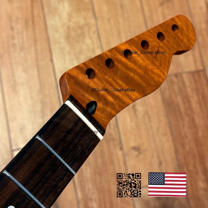 Puede incluir: Primer plano del m&aacute;stil y la pala de una guitarra. La pala es de color marr&oacute;n claro con seis agujeros para las clavijas. El diapas&oacute;n es marr&oacute;n oscuro con marcadores de traste blancos. El texto "Guitar Closet eBay" es visible.