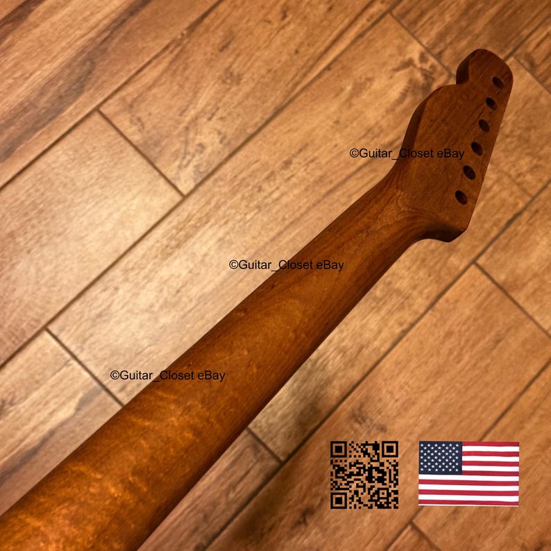 May include: A natural wood guitar neck featuring a prominent flame maple grain pattern, a smooth finish, and a headstock with six pre-drilled tuning peg holes. The text Guitar_Closet eBay is visible on the neck and headstock, alongside a QR code.