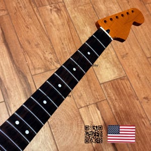 May include: A set of three ceramic mugs with a speckled, matte finish. The mugs are in shades of cream, light gray, and dark gray. Each mug has a simple, minimalist design, perfect for coffee or tea.